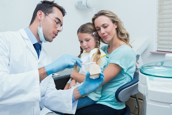 How A Family Dentist Can Keep Your Entire Family Smiling